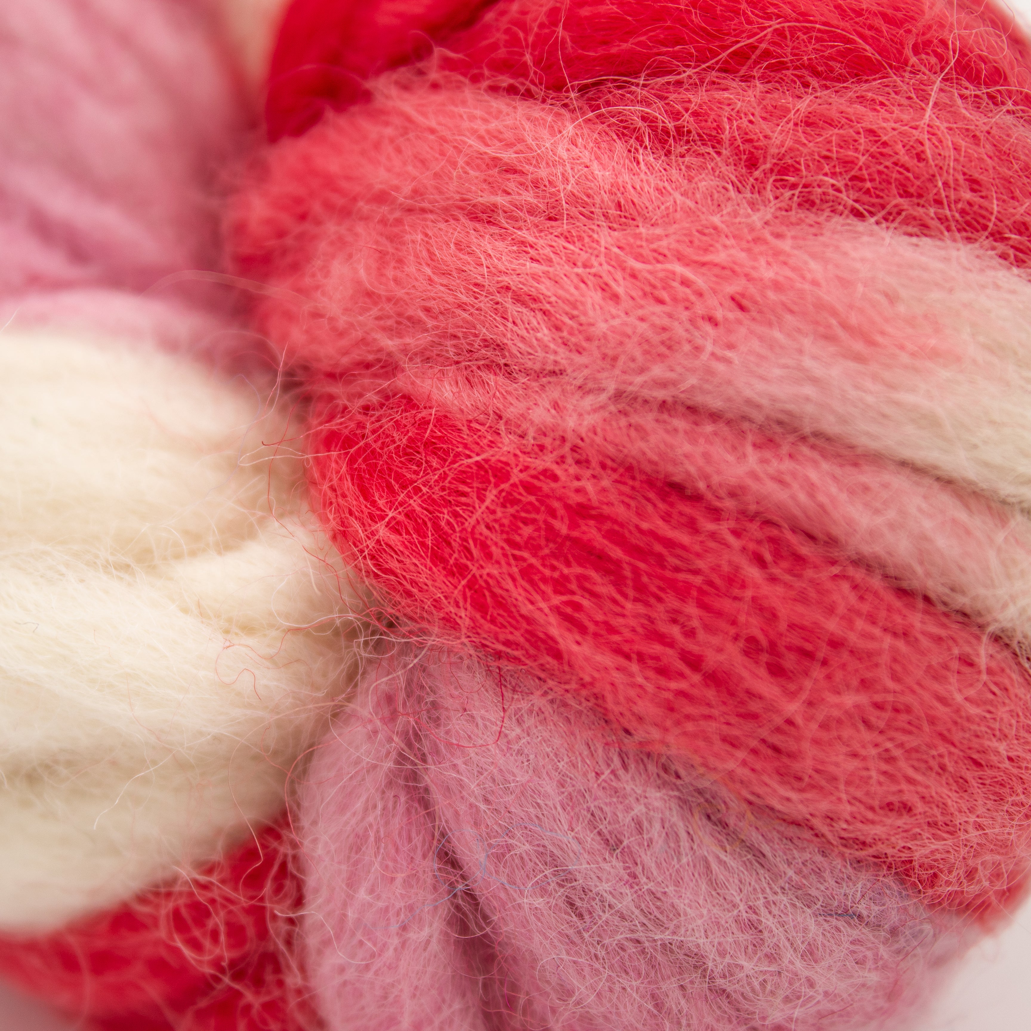 Darn Good Yarn Variegated Thick and Thin Wool Yarn in Red + Pink